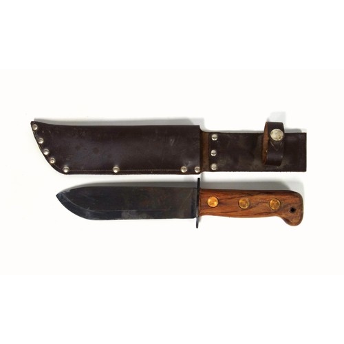 507 - A British Army survival knife 1984, in a sheath dated 1988, blade length 18.2cm, serial number 12782... 