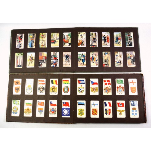 521 - 6 albums containing mainly 1930s Player's Cigarette cards, including 2 sets of cricketers (100), set... 