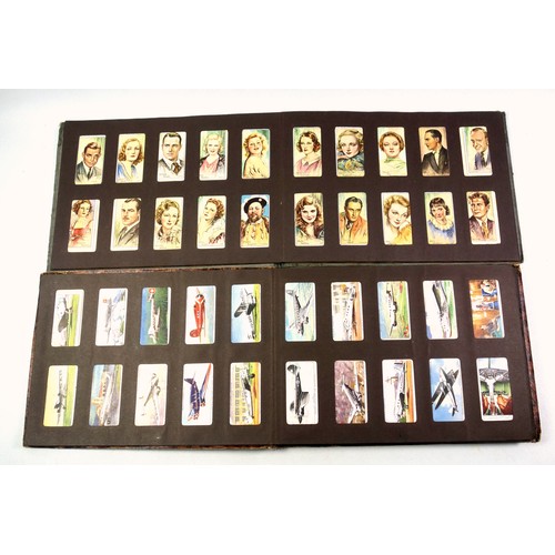 521 - 6 albums containing mainly 1930s Player's Cigarette cards, including 2 sets of cricketers (100), set... 