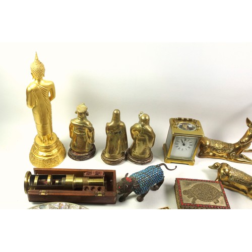 534 - A brass carriage clock and various other brass items to include weighing scales, candle snuffers, a ... 