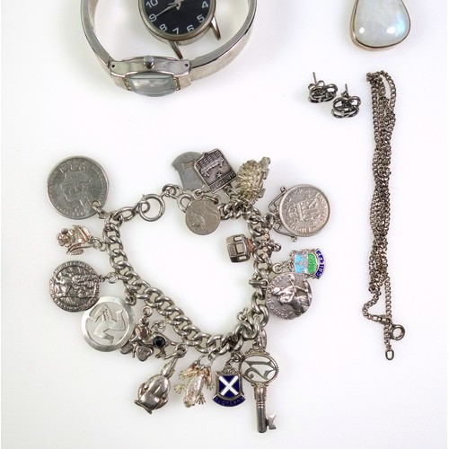 161 - Silver bracelet with a George IV shilling, 1826, George VI 6d, 1943, and 17 charms; Greek key style ... 