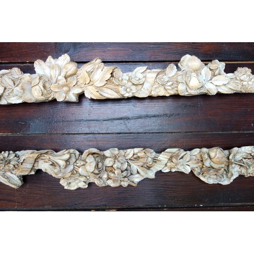 532 - Two decorative composition moulded limewood effect wall appliques, with flowers and leaves, hooks ve... 