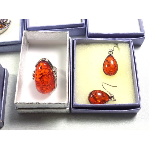 151 - Amber ring, pair of matching pendant earrings, and a good quantity of costume jewellery, mostly with... 