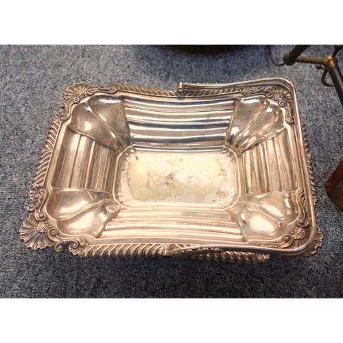 527 - Victorian silver plated cake basket with a gadrooned and scallop rim, and swing handle, W.31cm; copp... 