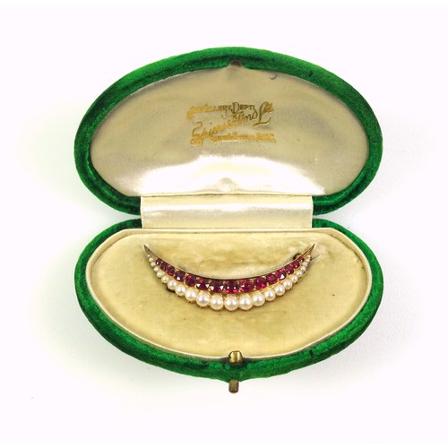 252 - Edwardian gold ruby and pearl set crescent brooch, length 4.2cm, fifteen graduated rubies and twenty... 