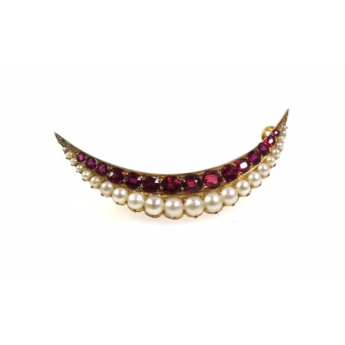 252 - Edwardian gold ruby and pearl set crescent brooch, length 4.2cm, fifteen graduated rubies and twenty... 