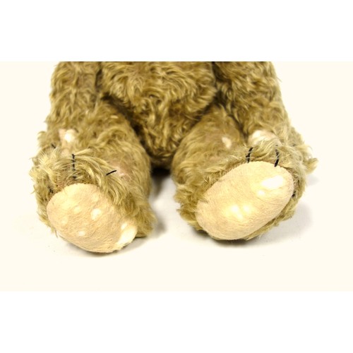 131 - Large Mohair Teddy Bear, with back hump, and growler (working but hesitant), some splits, H. 55 excl... 