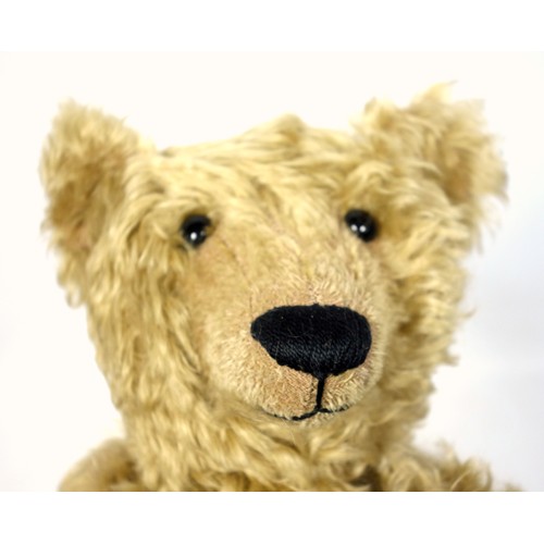 131 - Large Mohair Teddy Bear, with back hump, and growler (working but hesitant), some splits, H. 55 excl... 