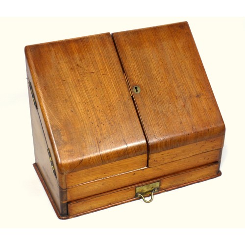 538 - Late Victorian walnut stationery box, the sloping front with 2 hinged covers disclosing 2 wells and ... 