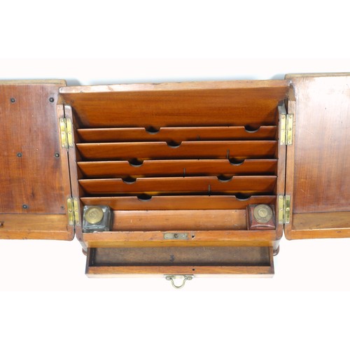 538 - Late Victorian walnut stationery box, the sloping front with 2 hinged covers disclosing 2 wells and ... 