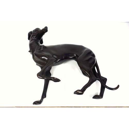 415 - A pair of bronzed sculptures of whippets, 20th century, unsigned, after P J Mene with head turned an... 