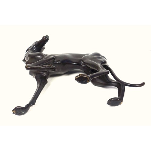 415 - A pair of bronzed sculptures of whippets, 20th century, unsigned, after P J Mene with head turned an... 