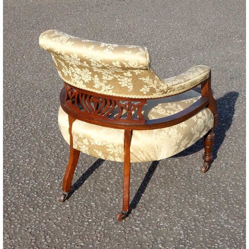 220 - Edwardian carved walnut open armchair with a pierced splat, the bow fronted seat, arms and back upho... 