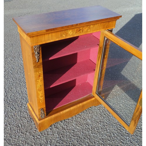 221 - Victorian inlaid walnut pier cabinet, with a glazed panelled door flanked by gilt metal mounts, step... 