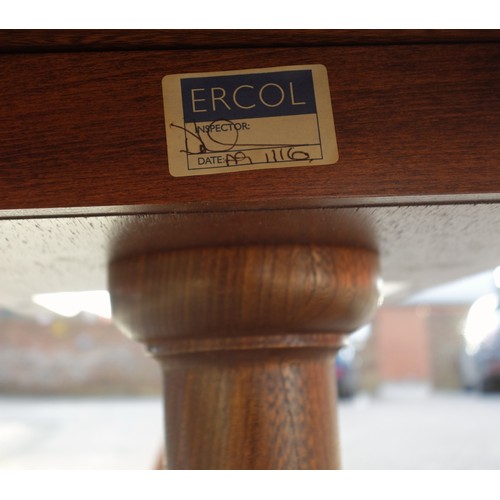 222 - Ercol elm dining table with a circular top, on a turned baluster column and 4 cabriole legs, 74 x 10... 