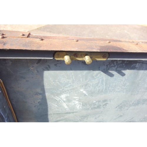 231 - Painted wood campaign chest with iron corners and mounts, the hinged cover enclosing a metal lined i... 