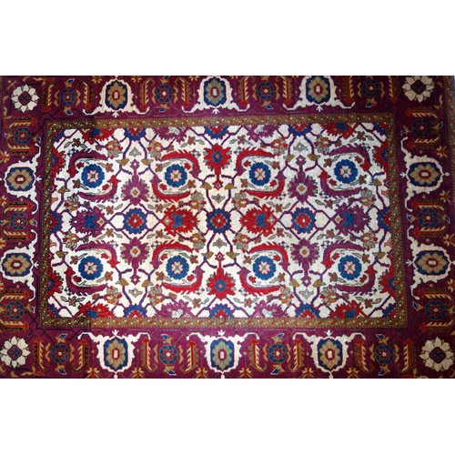 238 - South Caucasian Karabagh rug, the camel-coloured field with all-over herati pattern, within a madder... 