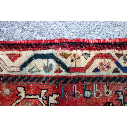 251 - Caucasian Lori Pambak Kazak rug, the abrashed madder field with 3 conjoined serrated medallions, fla... 