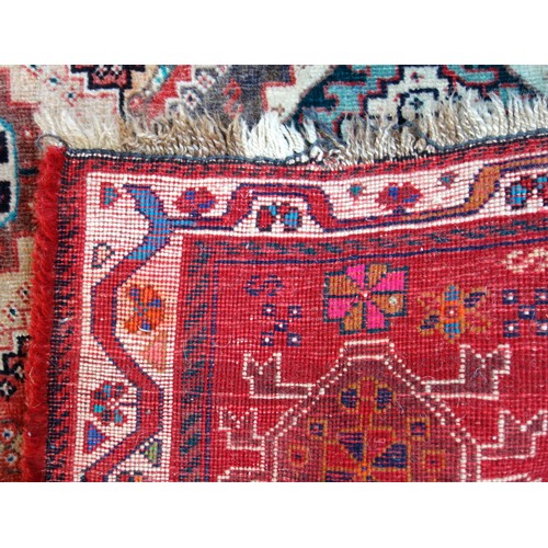 251 - Caucasian Lori Pambak Kazak rug, the abrashed madder field with 3 conjoined serrated medallions, fla... 