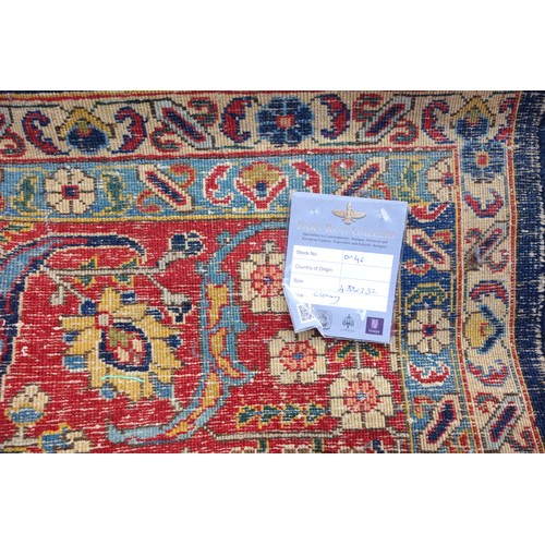 267 - Large Early 20th Century Persian Tabriz carpet, the indigo field with all-over palmette, rosette, an... 