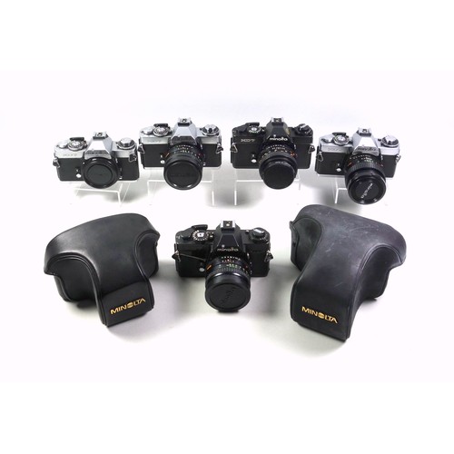 293 - 5 Minolta XD7 cameras, with 4 lenses. (9)