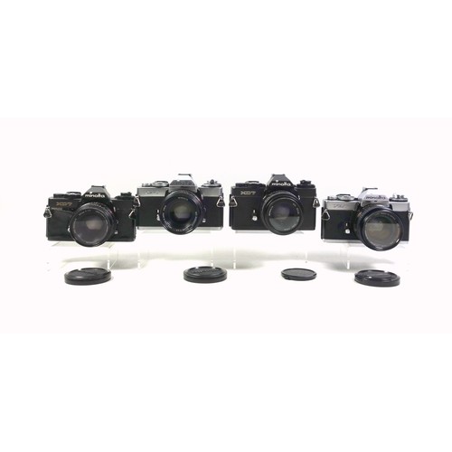 293 - 5 Minolta XD7 cameras, with 4 lenses. (9)