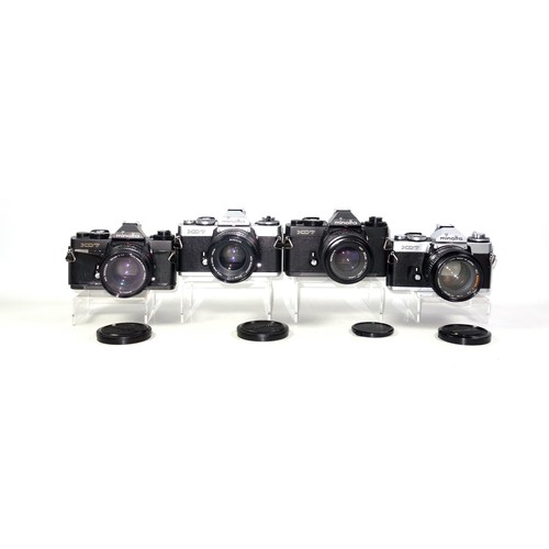 293 - 5 Minolta XD7 cameras, with 4 lenses. (9)