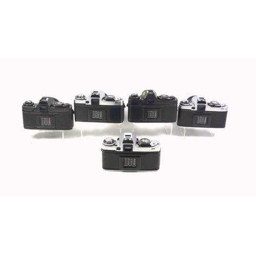 293 - 5 Minolta XD7 cameras, with 4 lenses. (9)