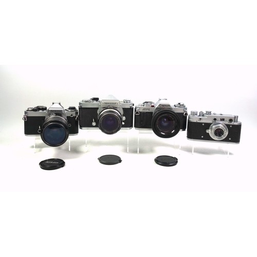 301 - Mixed lot of 5 cameras comprising Nikon FE, Nikkormat FT N, Zorki, Canon AV1 and a Zeiss Ikon Nettar... 