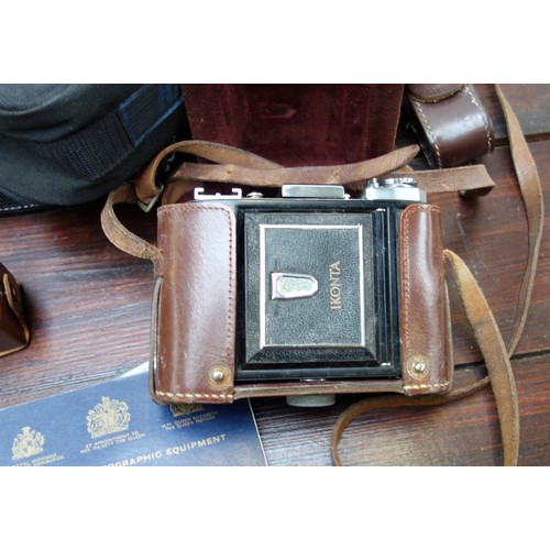 314 - Zeiss Ikonta camera in leather case with accessories, Minolta K-700, Pentax KX, Houghton Butcher, ca... 