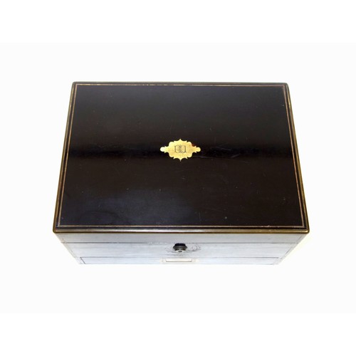 348 - Victorian fine ladies ebony toilet box with inset brass handles and monogram, the hinged top disclos... 