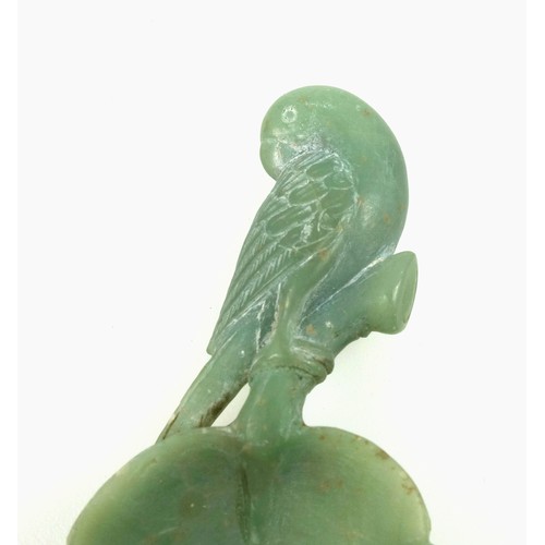 461 - Carved jade caddy spoon with a leaf bowl and parrot handle, L.10.4cm, with ephemera and photos. (a l... 