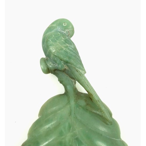 461 - Carved jade caddy spoon with a leaf bowl and parrot handle, L.10.4cm, with ephemera and photos. (a l... 