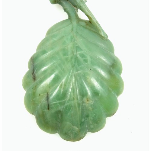 461 - Carved jade caddy spoon with a leaf bowl and parrot handle, L.10.4cm, with ephemera and photos. (a l... 