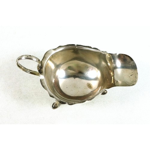 471 - Silver baluster sugar caster, by Garrard & Co., Birmingham, 1973, H.17cm; sauceboat, by A J Zimmerma... 