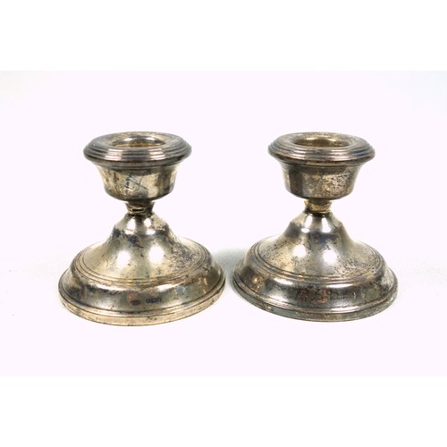 477 - Pair of silver dwarf candlesticks, by Broadway & Co., Birmingham, 1958, H.6.5cm; silver mounted desk... 