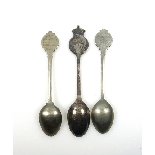 479 - Pair of George VI silver commemorative Coronation caddy spoons, each with a blue enamelled terminal ... 