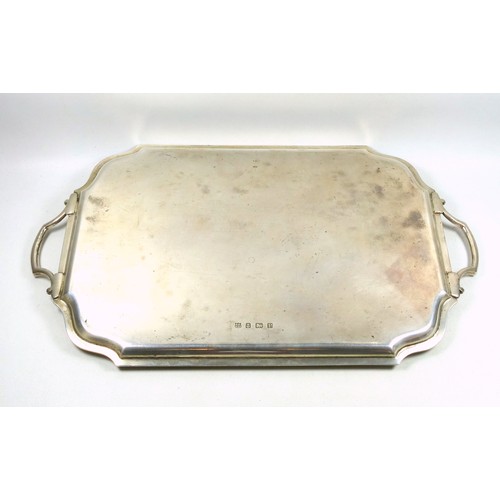 502 - George VI silver presentation tray, rectangular with shaped corners and 2 handles, engraved with an ... 