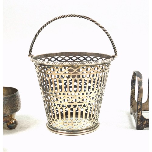 506 - George III silver sugar basket, of pail form with a rope twist swing handle, vacant cartouche and al... 