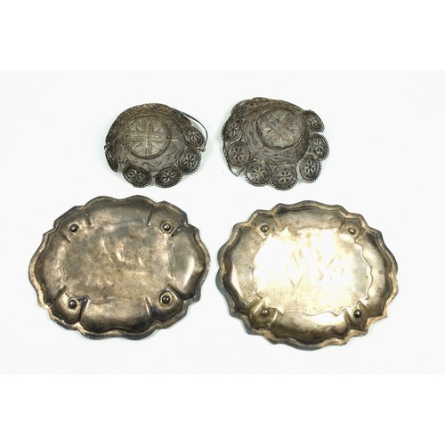 513 - Pair of Eastern white metal lobed dishes, each with a floral motif, on 4 ball feet, W.17.5cm, and a ... 