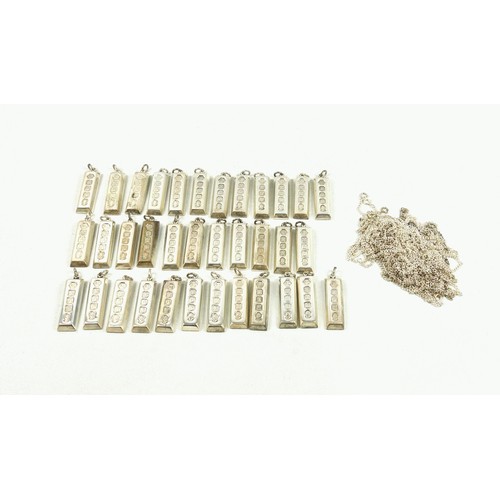 519 - 35 Britannia silver ingot pendants, by Carrs of Sheffield, 1977, H.4.7cm approx., 1110grs; and 25 ch... 