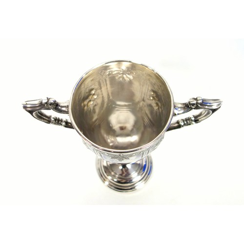 520 - Early 20th Century silver plated Britannia metal show jumping trophy cup with chased and embossed fl... 