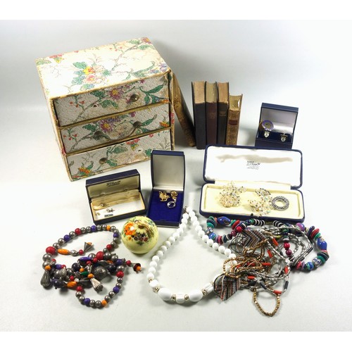 525 - Three native bead necklaces, other costume jewellery, 2 small leather bound books, 4 other books, je... 