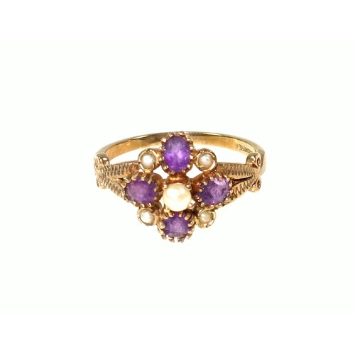 532 - Edwardian style 9ct gold ring with 4 amethysts and 5 seed pearls in a floral openwork setting by Reg... 