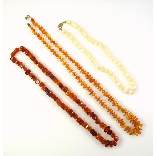 535 - An amber necklace, length 57.5cm, 46.3 grams; a butterscotch amber necklace (clasp detached), length... 