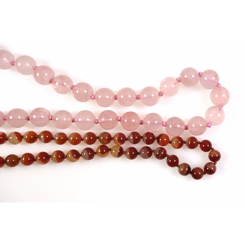 538 - A rose quartz necklace with a gilt white metal clasp stamped silver, length 62.5cm, the beads are 1.... 