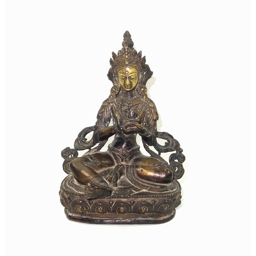 683 - Late 18th-Early 19th Century Tibetan bronze figure of Tara Buddha, finely hollow-cast seated on a lo... 