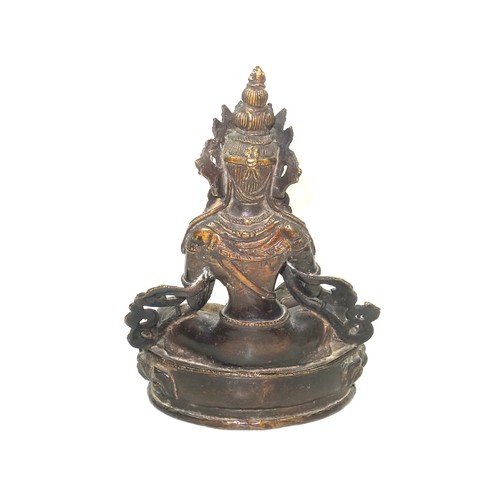 683 - Late 18th-Early 19th Century Tibetan bronze figure of Tara Buddha, finely hollow-cast seated on a lo... 