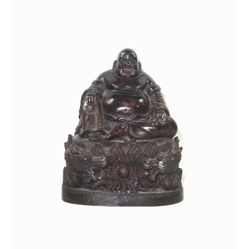 684 - 19th Century Chinese bronze figure of Budai finely hollow-cast with a laughing expression, seated in... 