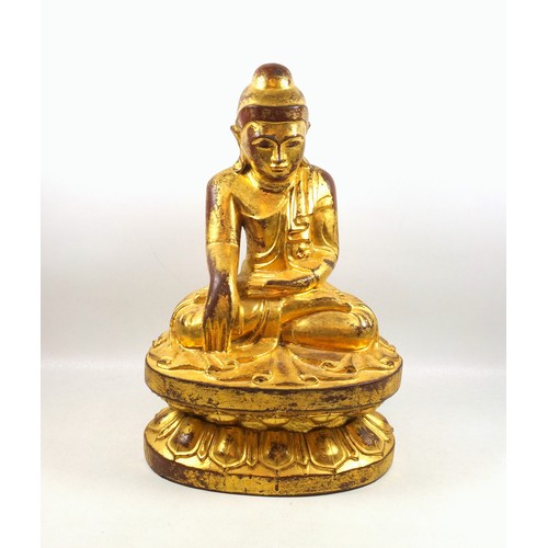 685 - Burmese carved giltwood figure of Buddha, wearing a pleated Sanghati and seated in Vajrasana on a do... 